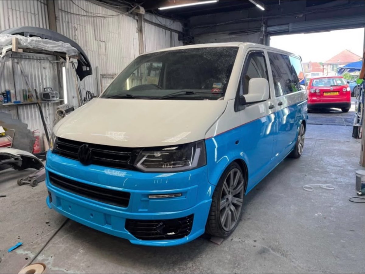 The same VW Transporter resprayed in a blue and white two-tone