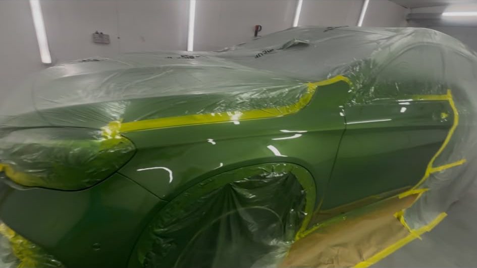 Green Mercedes coupe with a fresh gloss finish